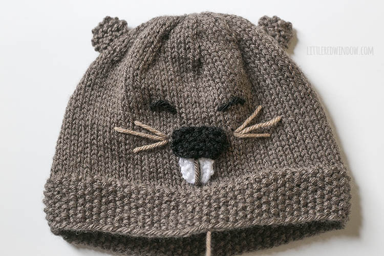 Beaver hat with tan whiskers sewn on next to the nose