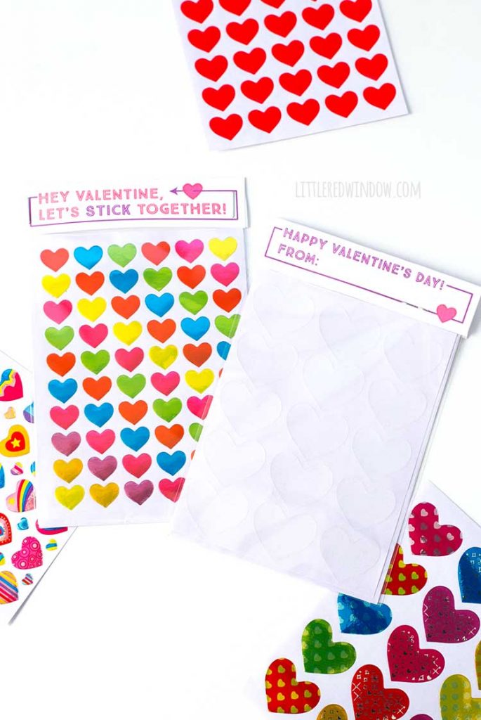 top view showing both sides of free printable stick labels attached to sheets of heart shaped stickers