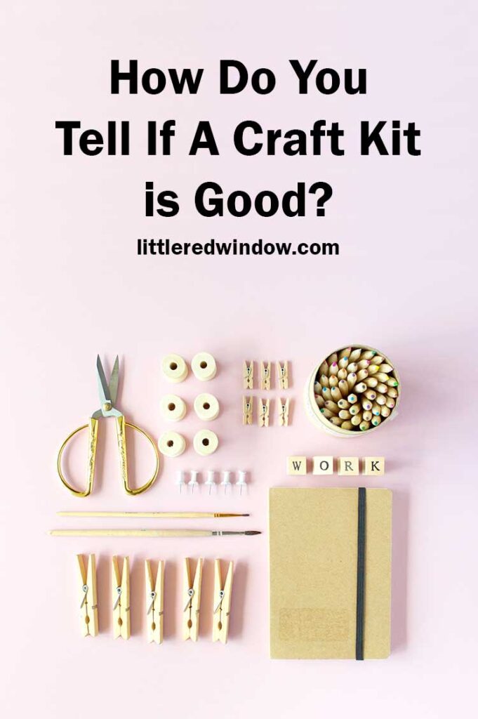 top view of craft supplies including scissors beads clothespins and a notebook in neutral colors laid out in a grid on a light pink surface