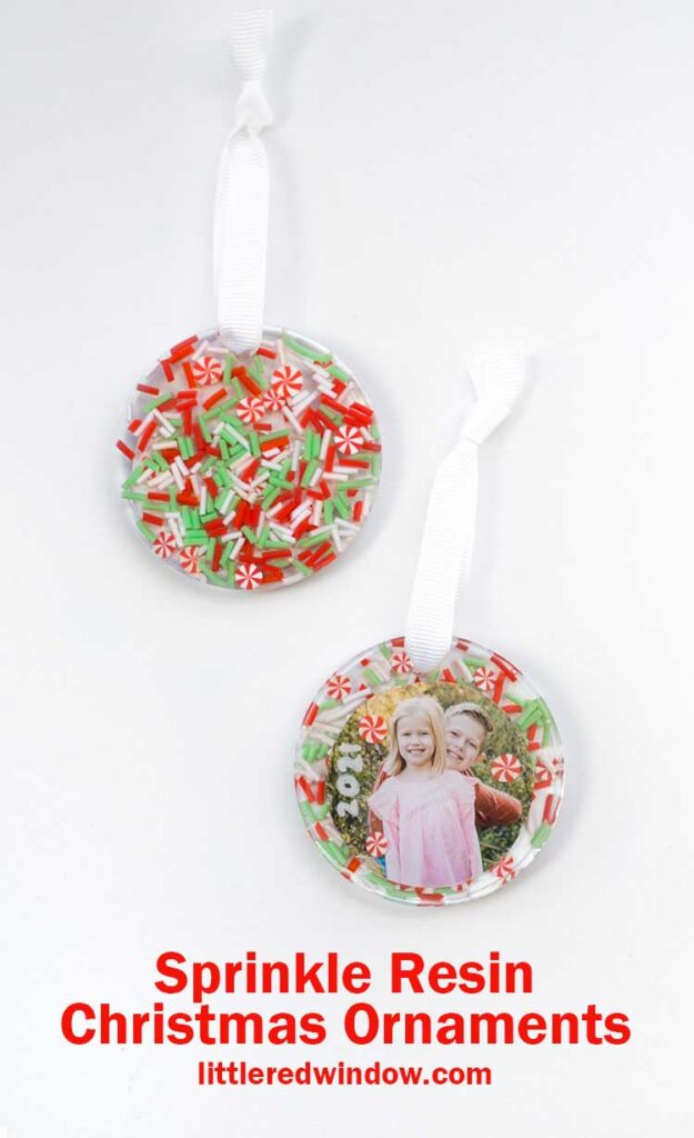two finished resin christmas ornaments one showing the photo on the front and one showing the sprinkles on the back on a white background