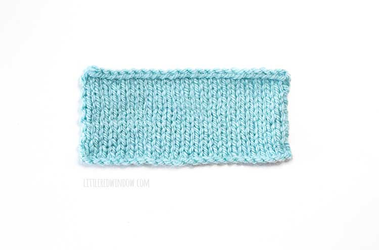 light blue rectangle knitting swatch on a white background showing Knitted cast on method