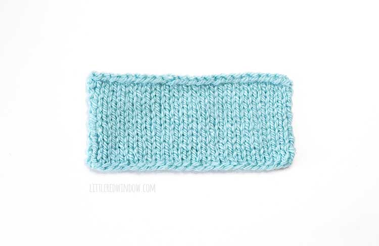 light blue rectangle knitting swatch on a white background showing German twisted cast on method