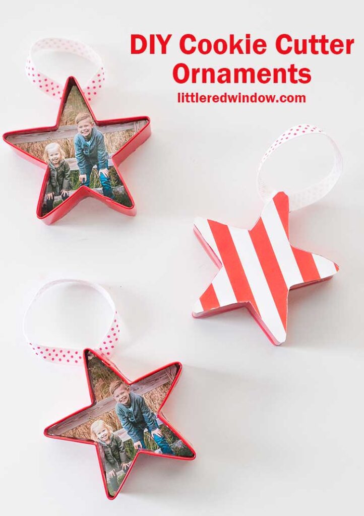 three red star shaped cookie cutter ornaments on a white background 