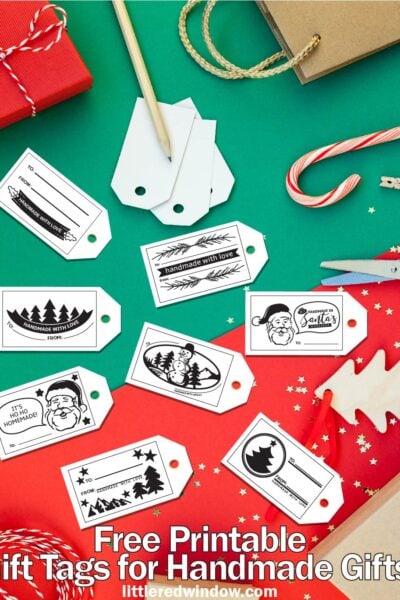 a varitey of christmas themed white gift tags on a red and green background with wrapping supplies